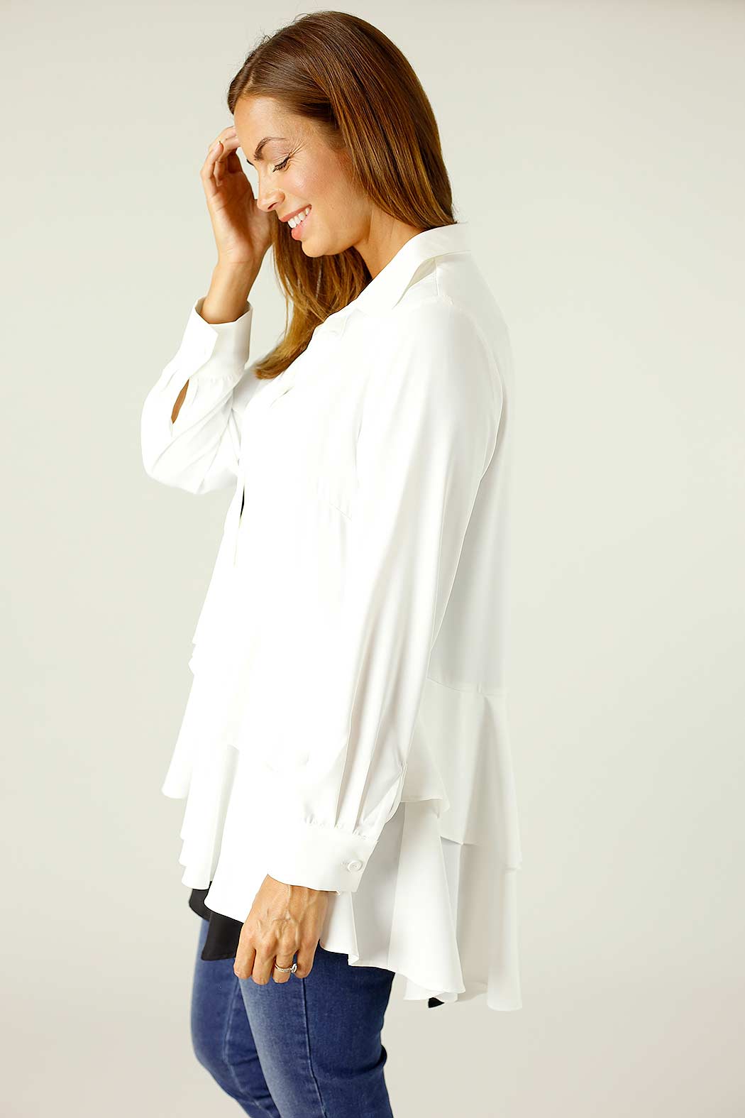Ivory Soft Touch Paris Shirt front‑on, classic collar and cuffs, tiered flounces cascade over hips for an elevated look.