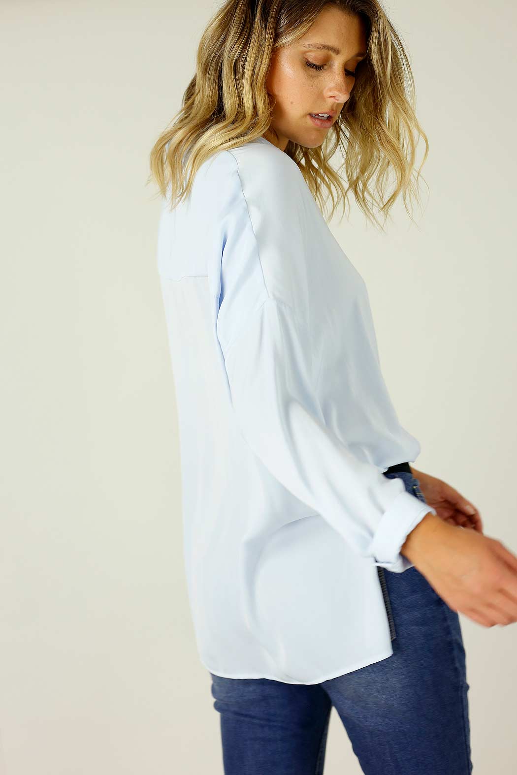 Effortless front view of the Pale Blue Seta Everyday Shirt, relaxed silhouette, soft drape, subtle button placket.