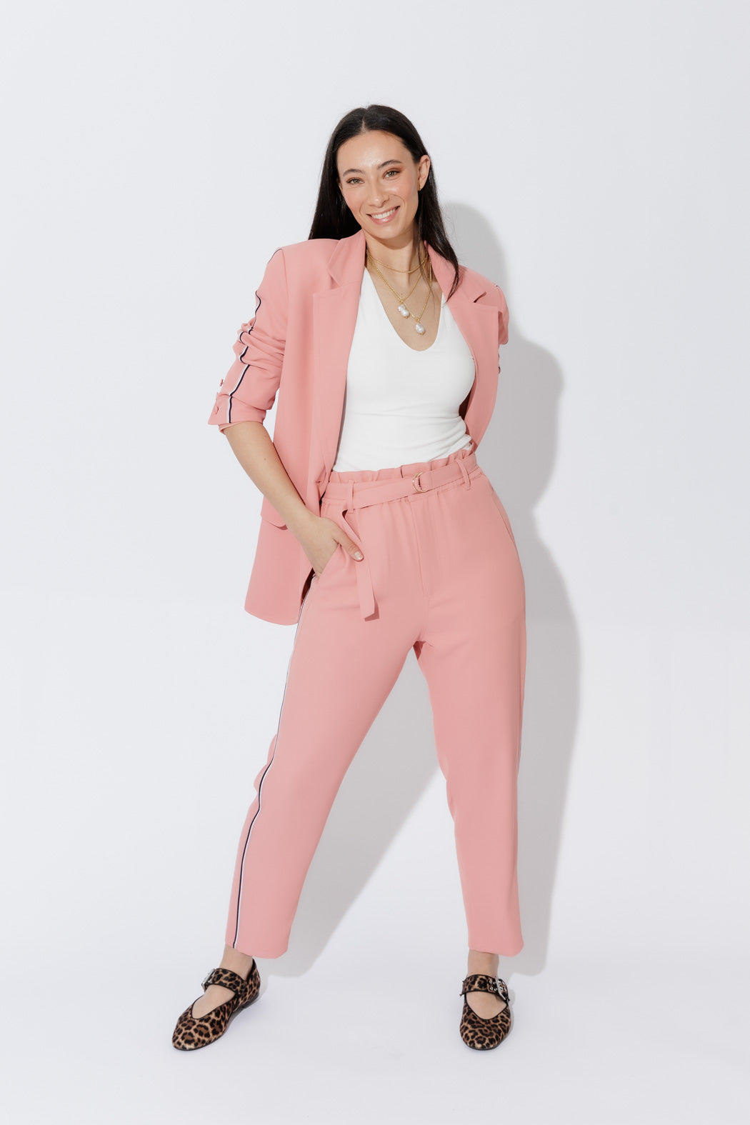 Blush Sport Paperbag Pant front view, highlighting the elastic waistband with D‑ring belt, side pockets and effortless look.