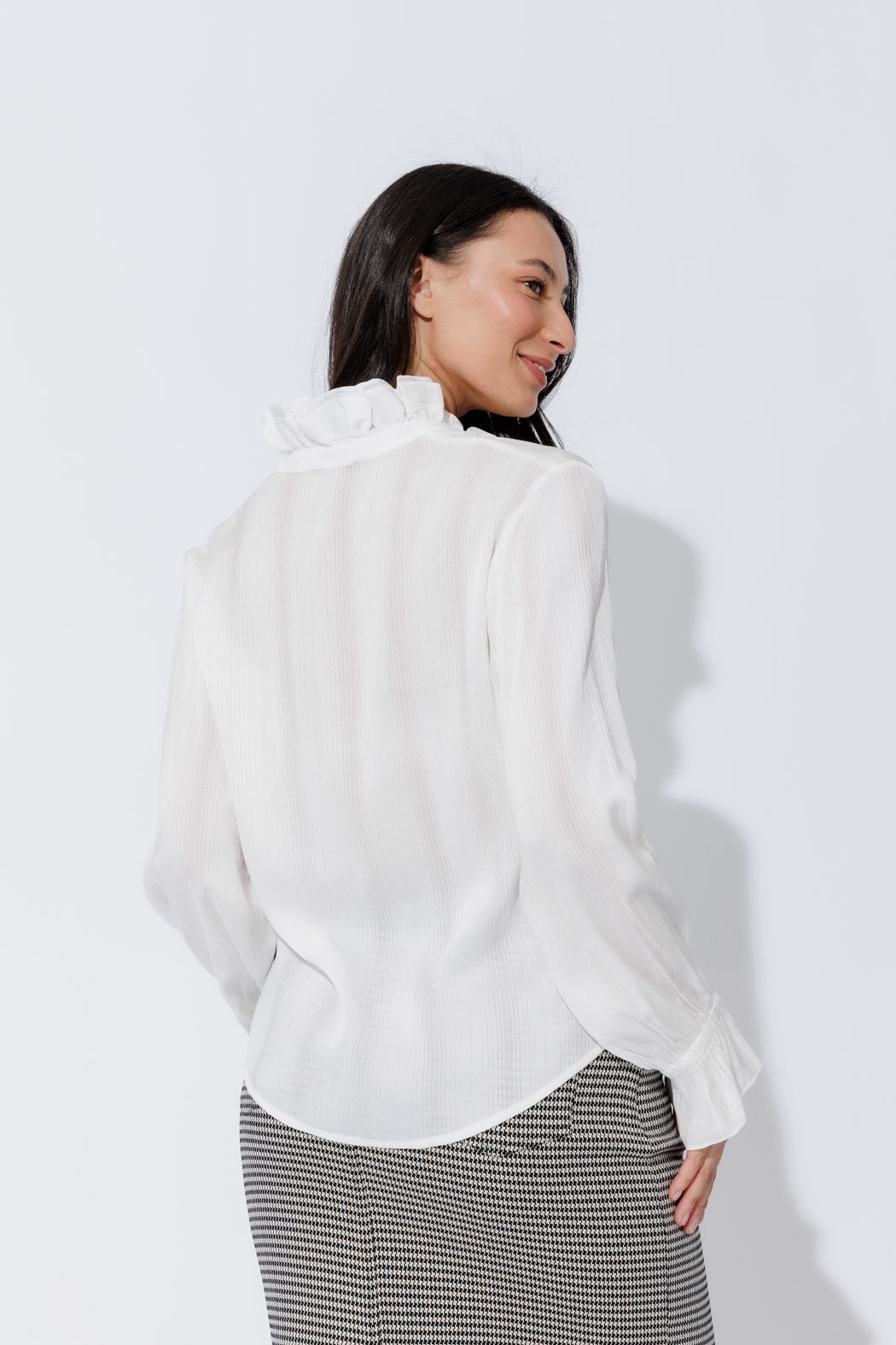 Front‑facing White Frill Shirt with delicate frill collar, classic button‑up front and soft elastic cuffs—effortless, elevated work‑wear.