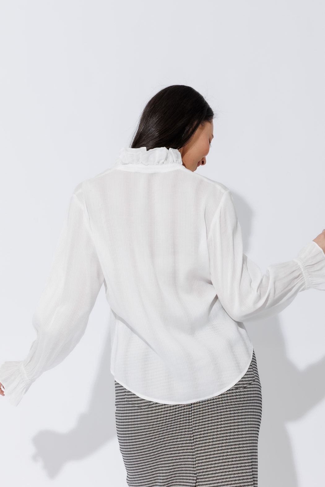 White Frill Shirt front, highlighting frill collar, button‑up front and elastic cuffs for an effortless, sophisticated look.