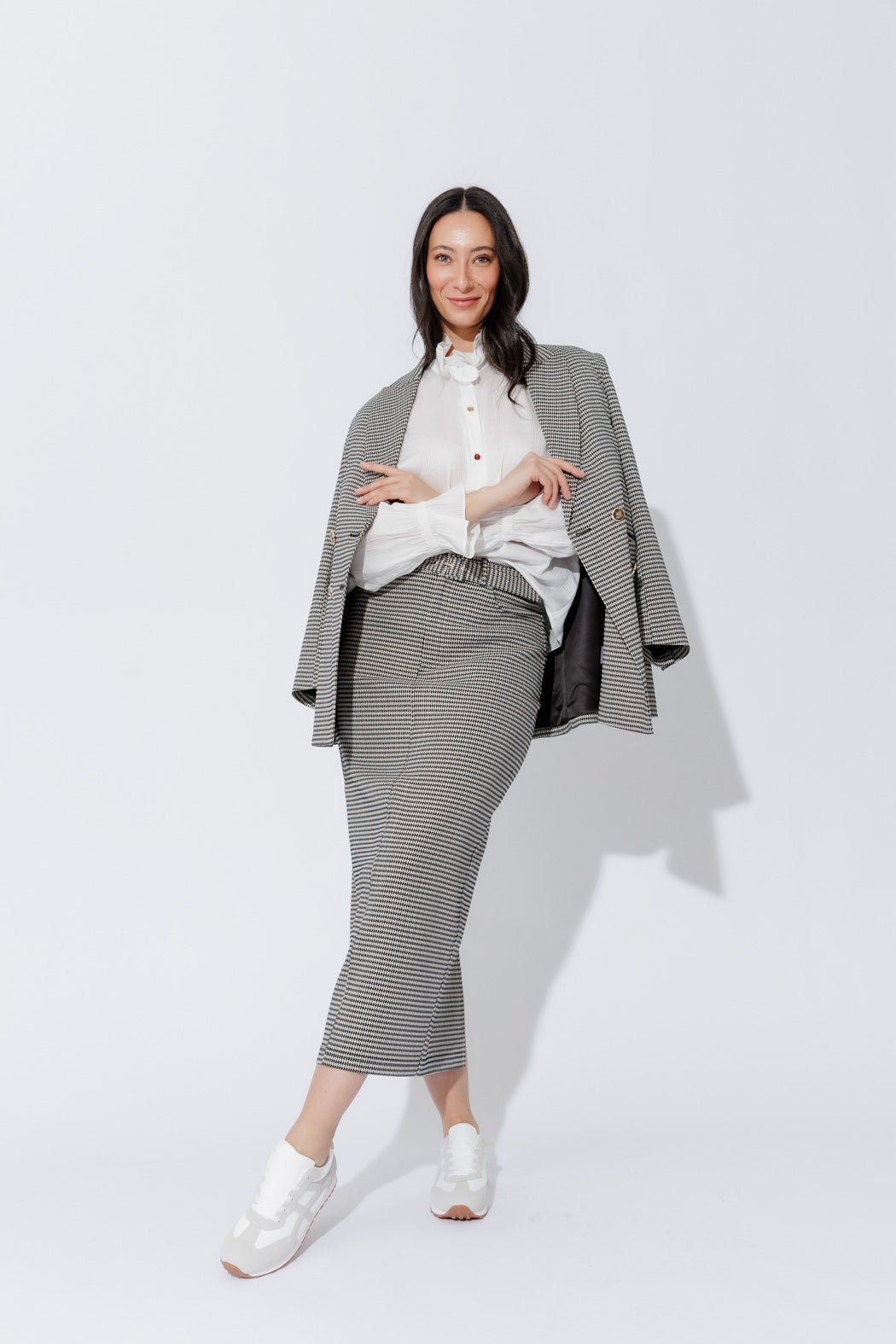 Effortless front view of the White Frill Shirt, highlighting its frill collar, crisp button‑up front and elastic cuffs.