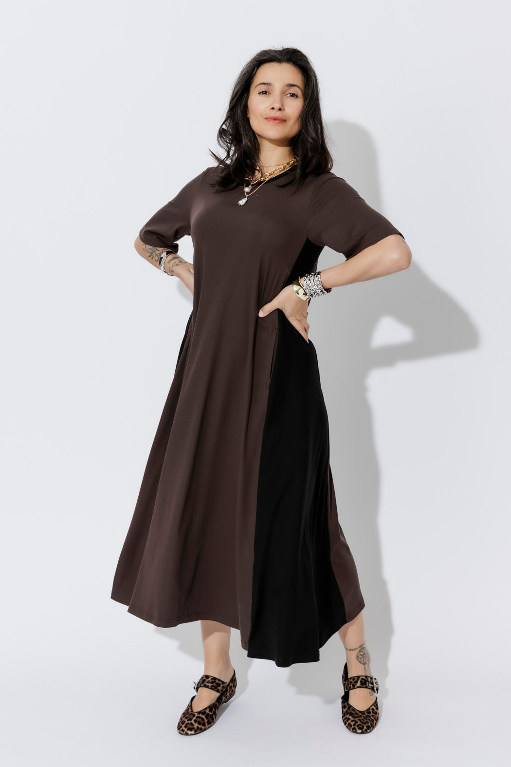 Soft Chocolate Tencel Bella Dress in a fluid A-line cut, styled with leopard flats for effortless, elevated work-wear.