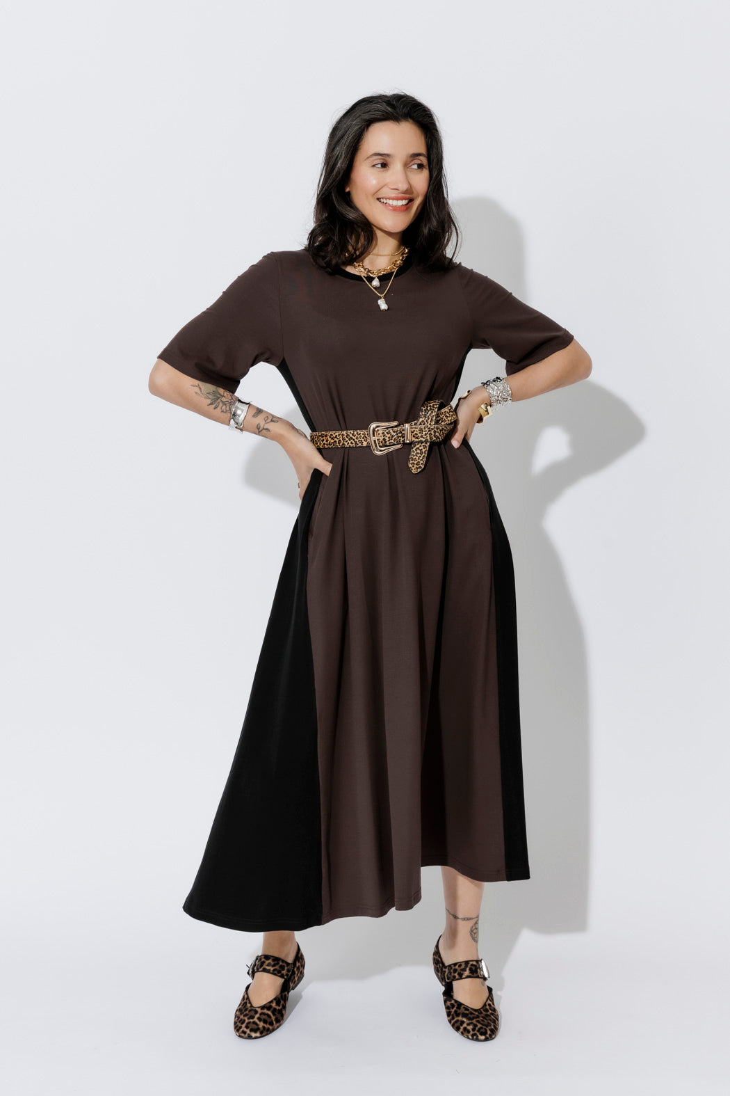 Chocolate Tencel Bella Dress in a fluid A-line silhouette, styled with a leopard belt for effortless sport-luxe polish.
