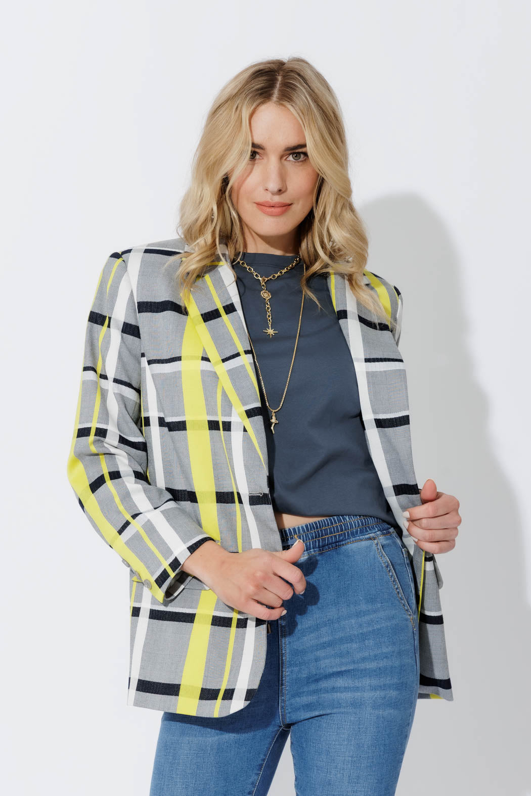 Neon Check Boyfriend Blazer in an oversized silhouette, styled open over denim with bold grey and neon yellow check weave.