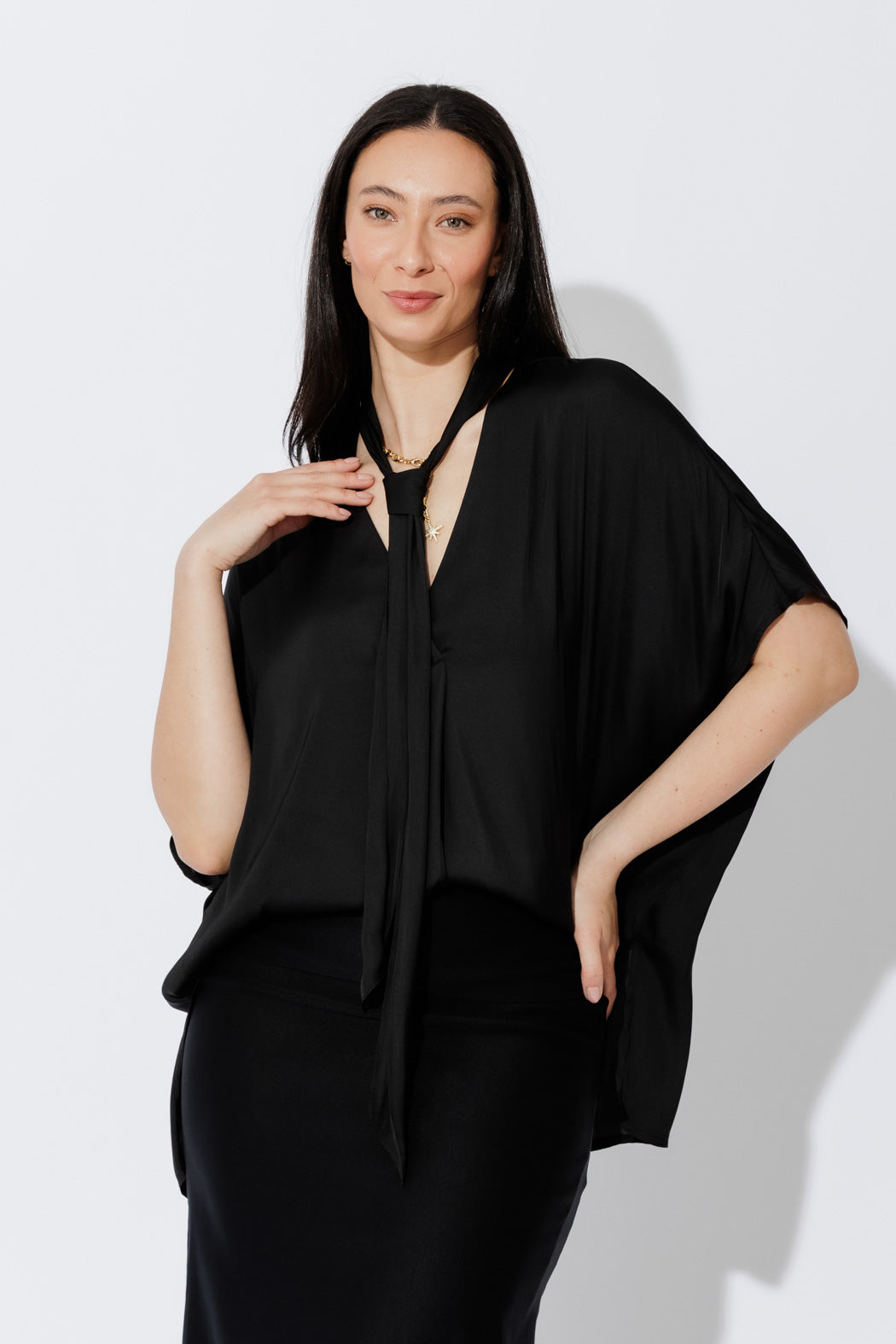 Effortlessly chic Black Tie Bondi top front‑on, oversized silhouette, soft drape, V‑neck and long side ties.