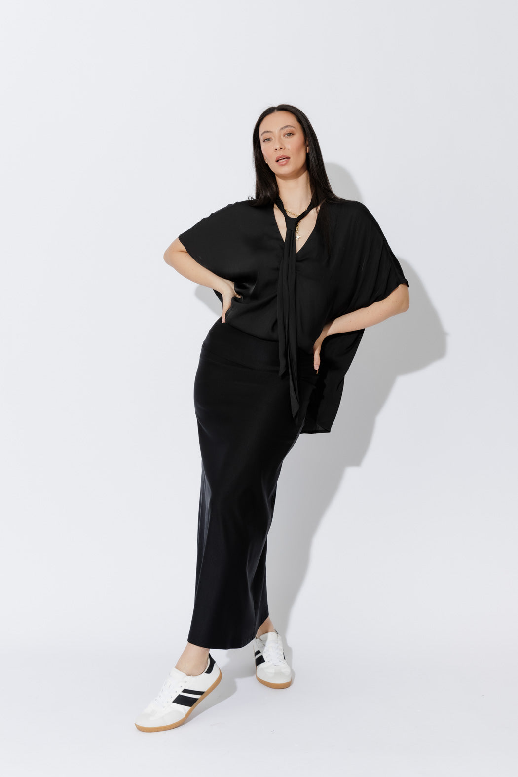 Effortlessly chic Black Tie Bondi top, front view showcasing oversized silhouette, soft drape, V‑neck and long side ties.