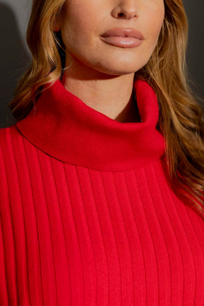 Close-up detail of the Red Cowl Neck Jumper, highlighting the ribbed knit and draped collar in elevated red.